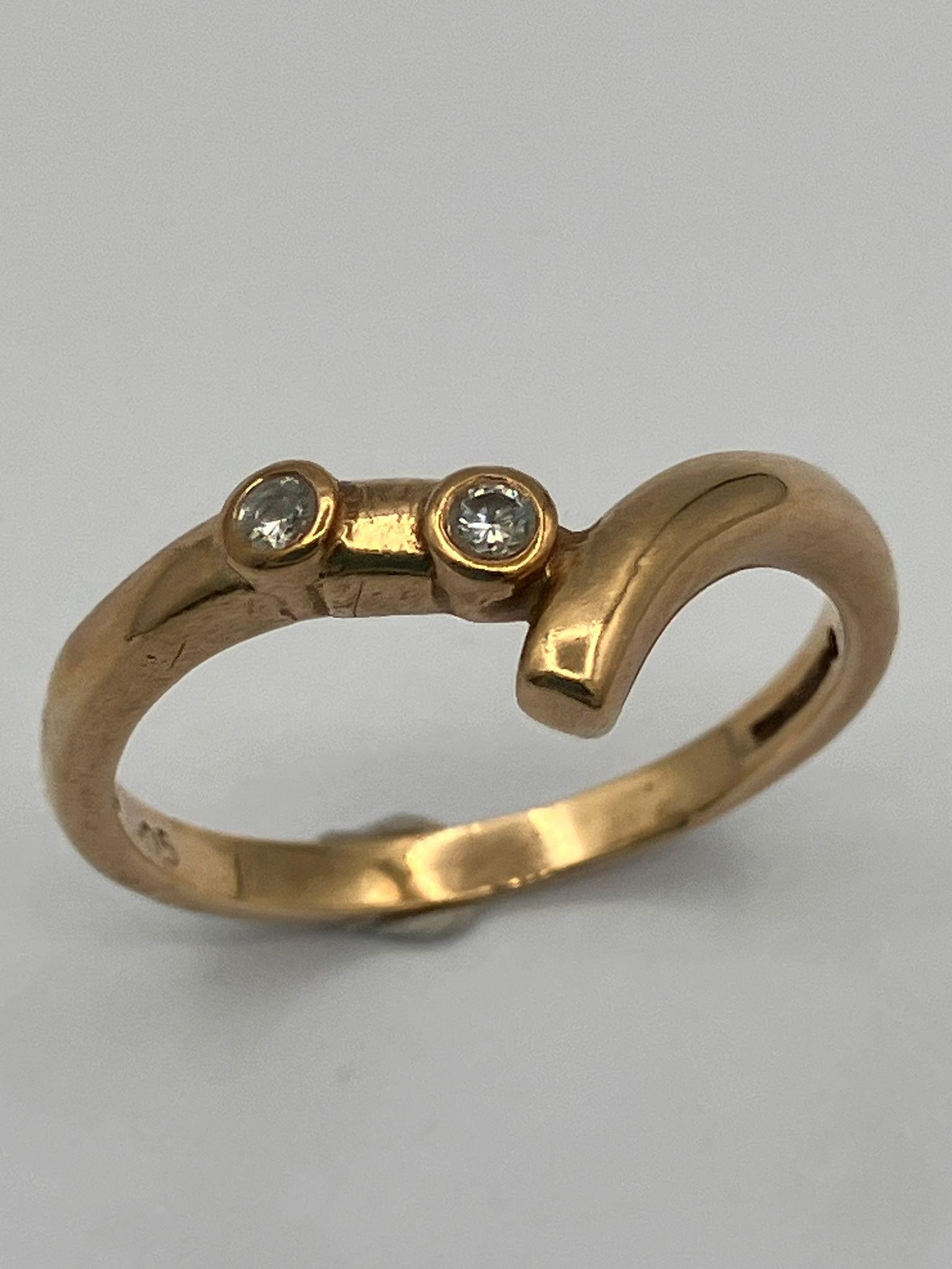 9 carat yellow GOLD and DIAMOND RING. A modernist version of the Classic WISHBONE RING set with 2 - Image 2 of 2