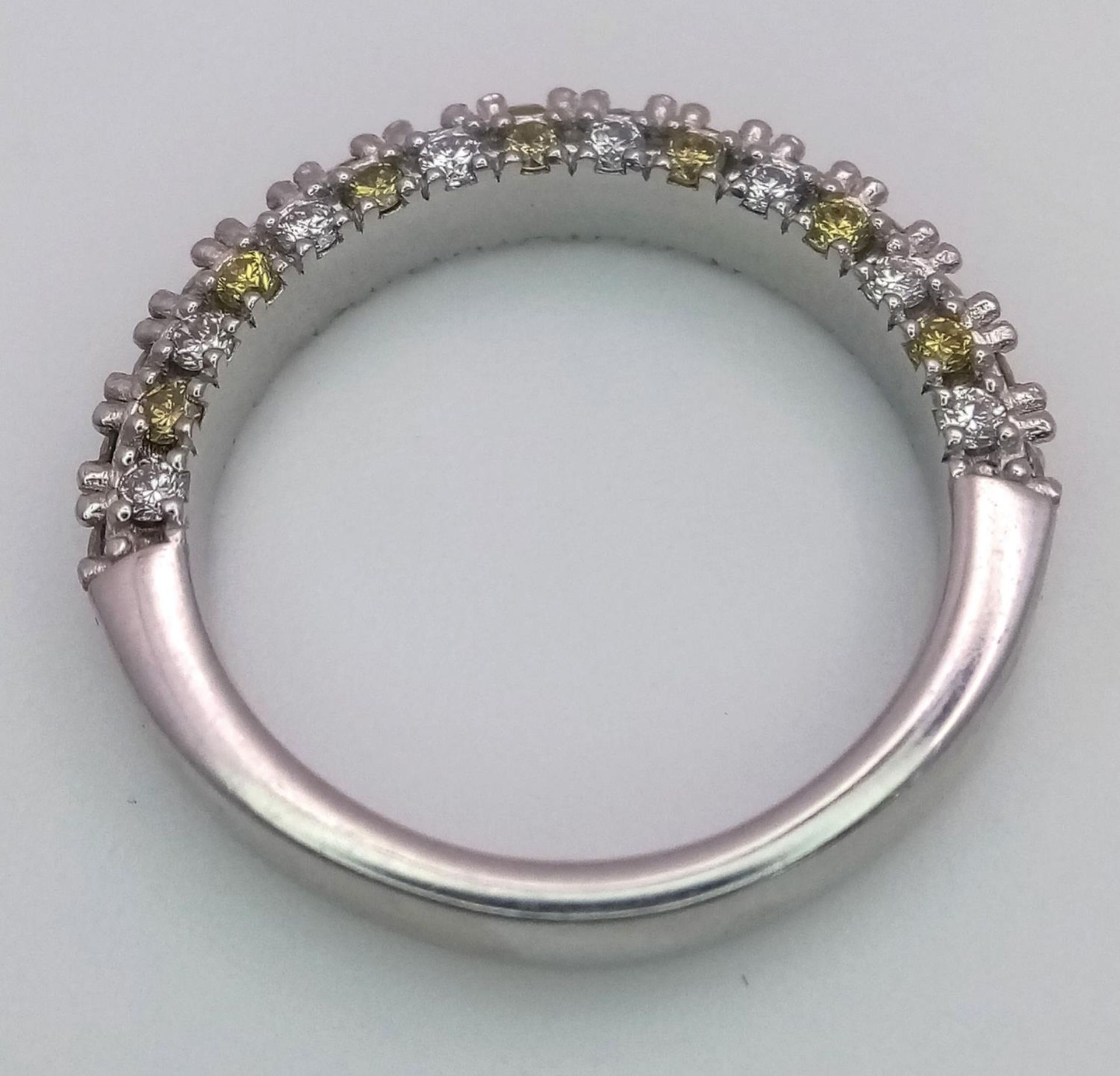A Platinum White and Yellow Diamond Three-Sided Half Eternity Ring. Size L. 6.3g total weight. - Image 6 of 9