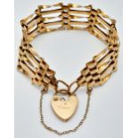 A Vintage 9K Yellow Gold Gate Bracelet with Heart Clasp. 16cm. 10.8g.