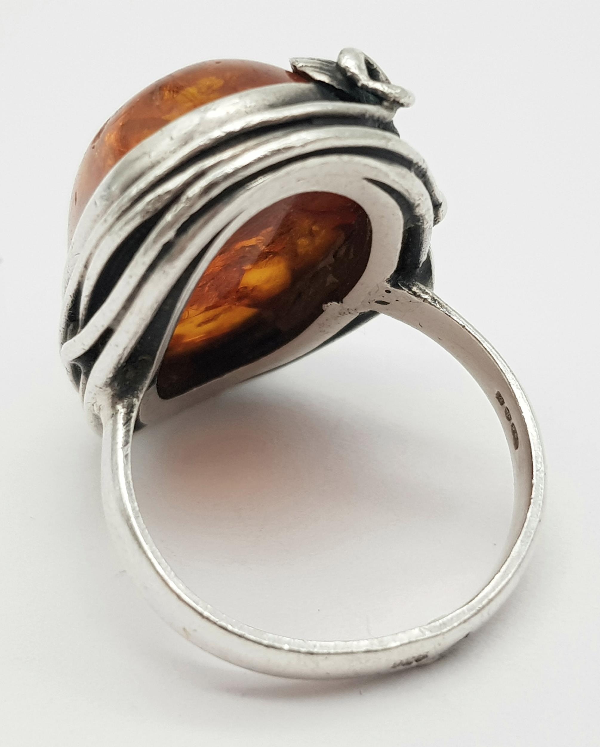 A Vintage Sterling Silver Hallmarked 1991 Ornate Mounted Amber Cabochon Ring Size P. Set with a 2. - Image 3 of 5