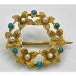 A 15ct Gold Small Wreath Brooch. Seed pearl and turquoise decoration. 22mm. 2.6g total weight.