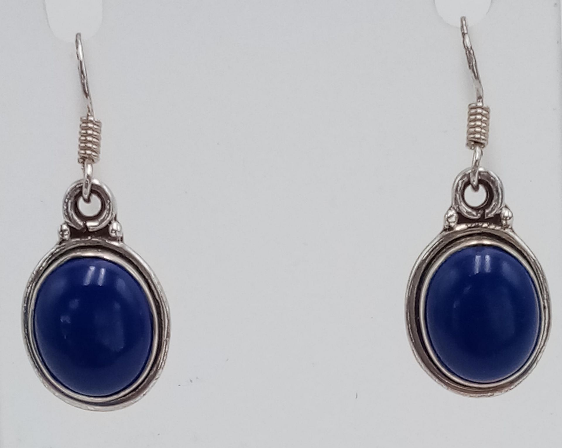 A Pair of Sterling Silver and Lapis Lazuli Cabochon Earrings. 3.4cm Drop. Set with 1.3cm Lapis - Image 2 of 3