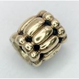 A 14K YELLOW GOLD PANDORA CHARM. 7mm length, 2.2g weight. Ref: SC 8134