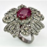 A 5ct Ruby Gemstone Cocktail Ring with 2ctw of Old Cut Diamond Decoration. Set in 925 Silver. Size