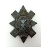 WW2 Plastic (Cellulose Acetate) Economy Black Watch Cap Badge.