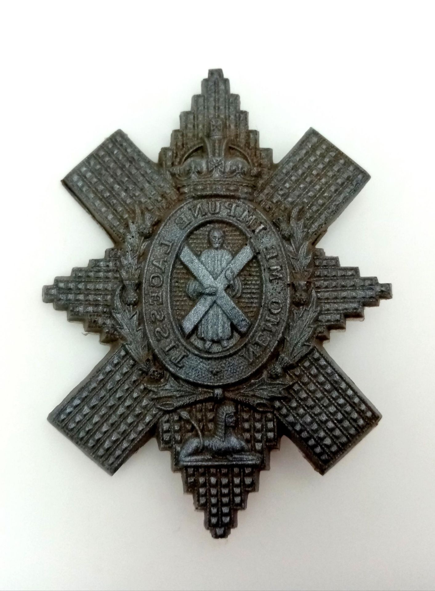 WW2 Plastic (Cellulose Acetate) Economy Black Watch Cap Badge.