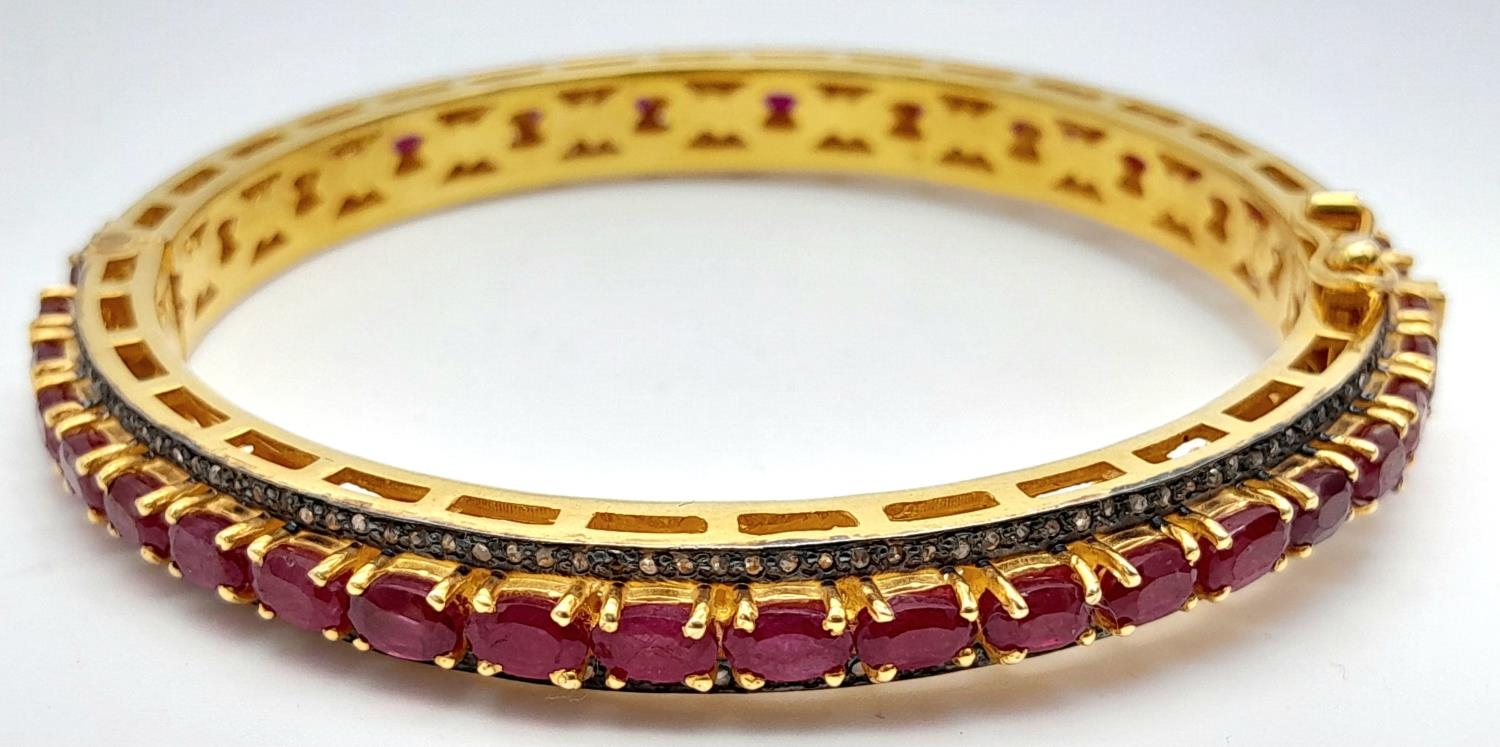A Ruby Gemstone Bangle Bracelet with Old Cut Diamond Surround. Rubies - 12ctw. Set in 925 silver. - Image 2 of 7