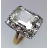 A 16ct Yellow Gold (tested as) Quartz and Diamond Ring, 0.20ct diamond, 10mmx7mm quartz, size J1/
