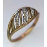 A Vintage 9K Yellow Gold Small Diamond Wave Ring. Size N. 1.8g weight.