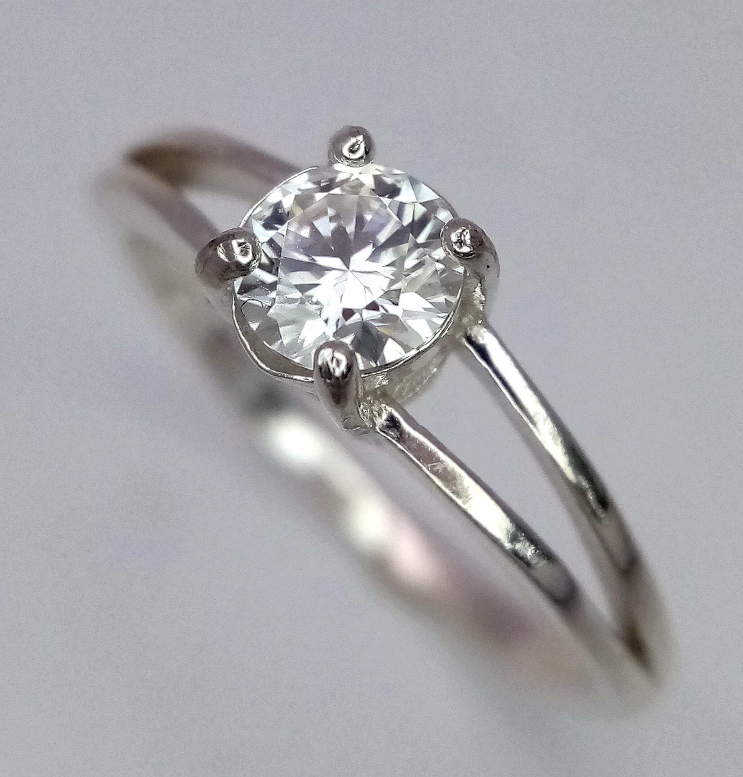 A 0.5ct Moissanite Solitaire Ring. Set in 925 silver. Comes with a GRA certificate. Size M. - Image 3 of 6