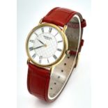 An 18 Carat Gold Plated Raymond Weil, Geneve, Model 9124, Unisex Date Watch. 33mm Including Case.