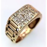 A Vintage 9K Yellow Gold and Diamond Decorative Belt Buckle Gents Ring. Size T. 4.4g total weight.