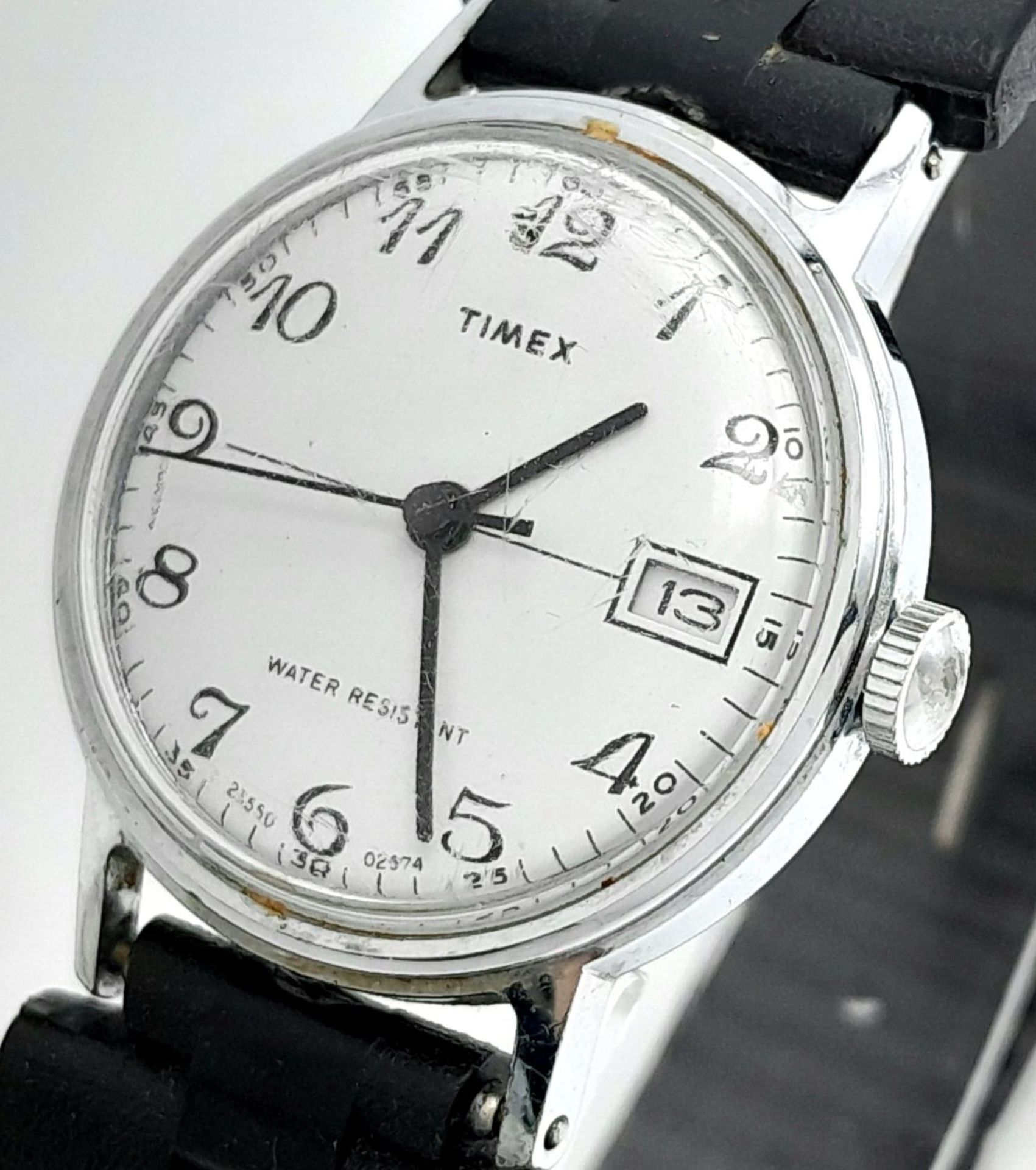 A Vintage Timex Mechanical Watch. Black rubber strap. Stainless steel case - 30mm. White dial with - Image 2 of 4