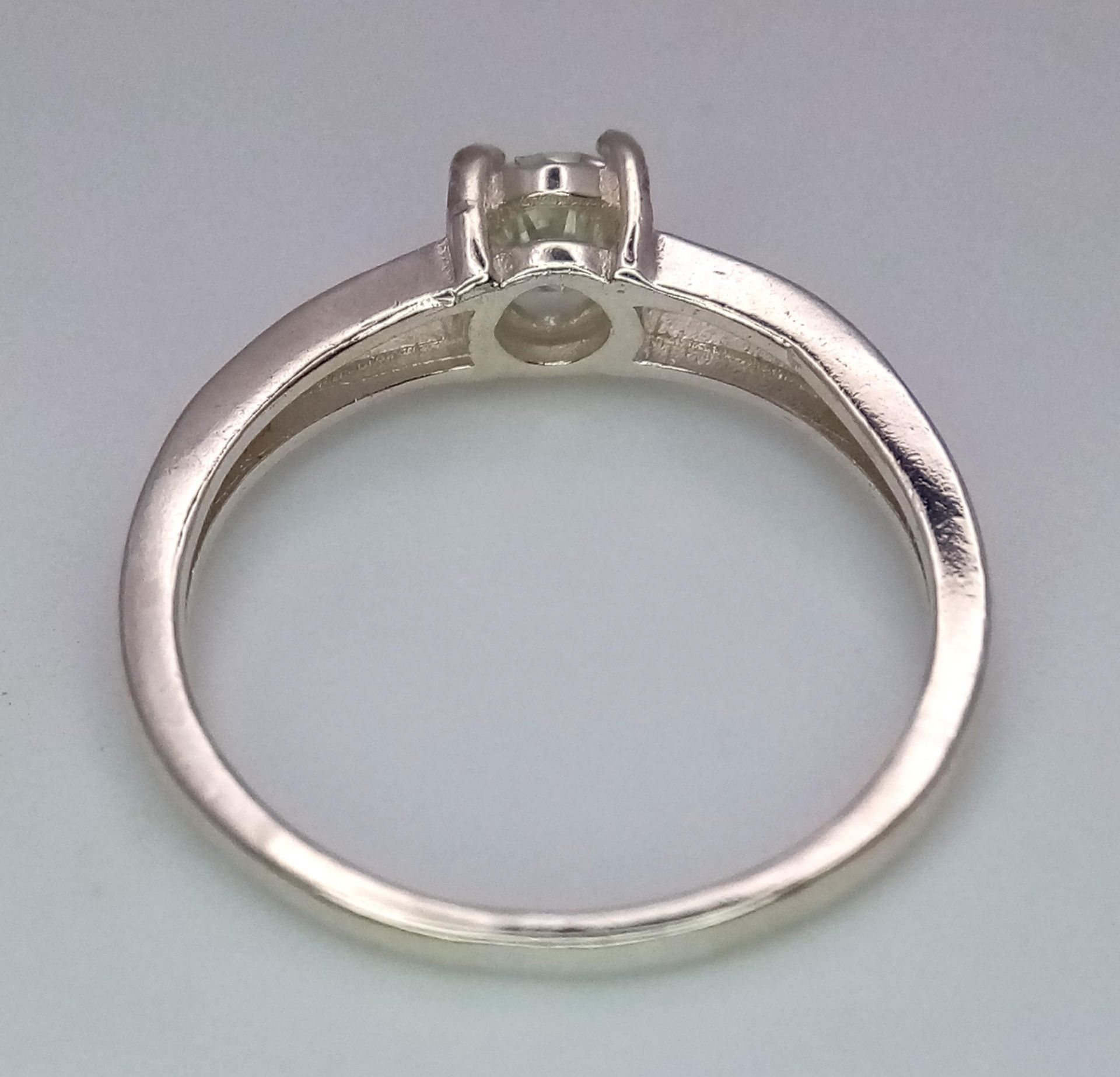 A 0.5ct Moissanite Solitaire Ring. Set in 925 silver. Comes with a GRA certificate. Size M. - Image 4 of 6