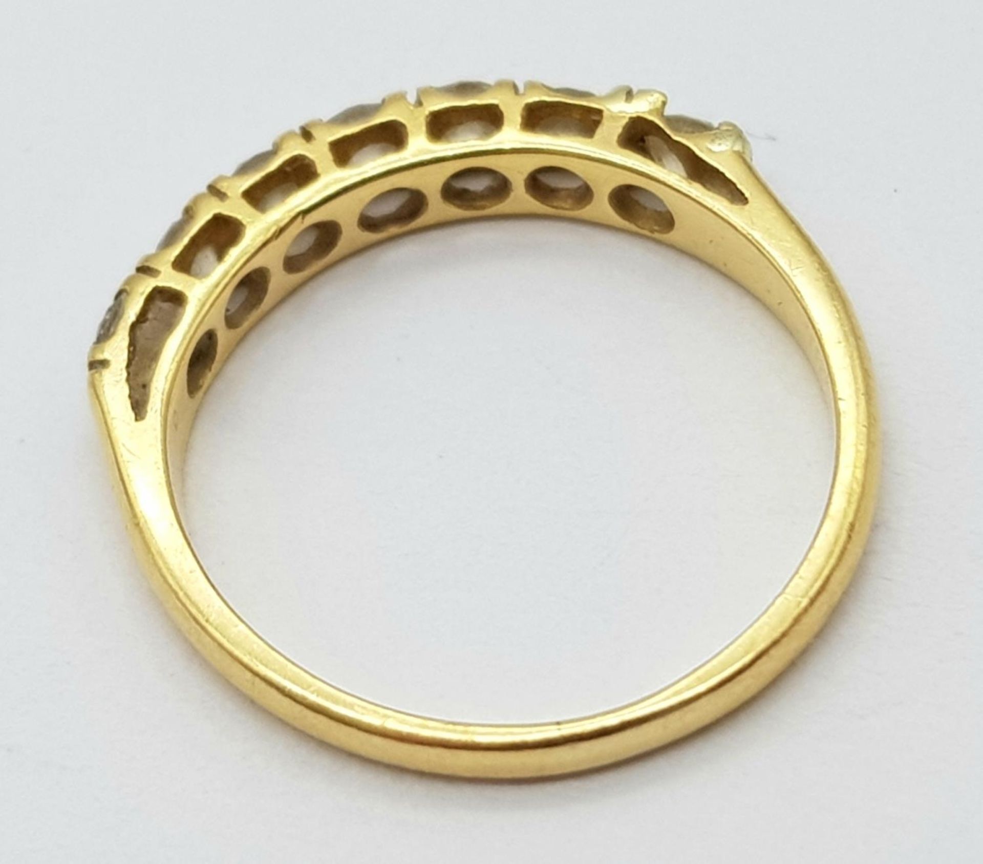 AN 18K (TESTED) YELLOW GOLD DIAMOND BAND RING. 0.35ctw, size I, 1.9g total weight. Ref: SC 9043 - Image 4 of 4
