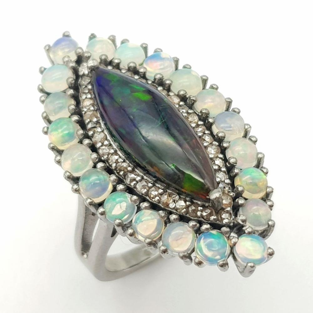 A 2ct Black Opal Marquise Shaped Ring with 1.80ctw White opal surround and .40ctw of Diamond - Image 2 of 6
