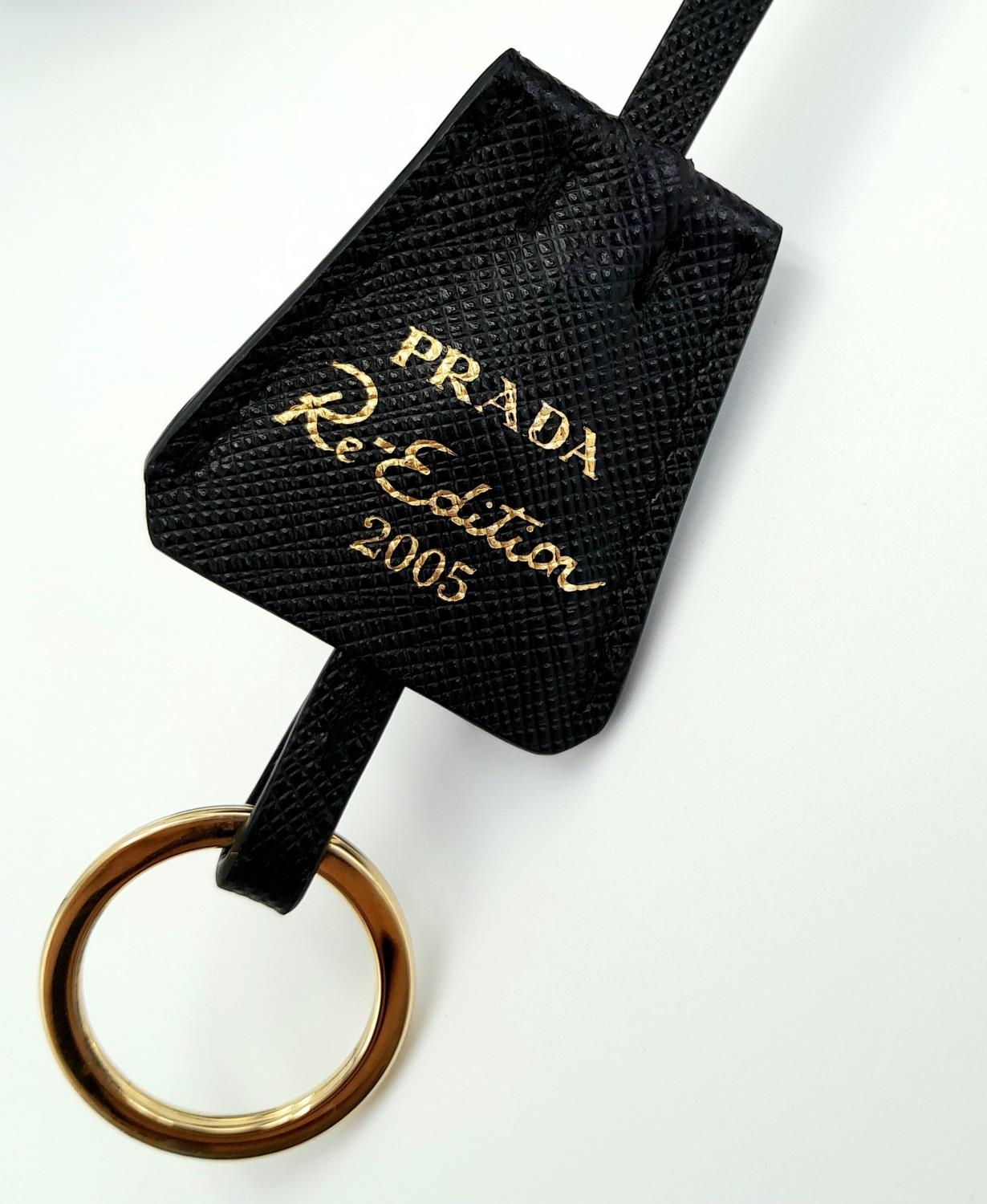 A Prada Black Re-Edition 2005 Bag. Saffiano leather exterior with gold-toned hardware, zip top - Image 9 of 15