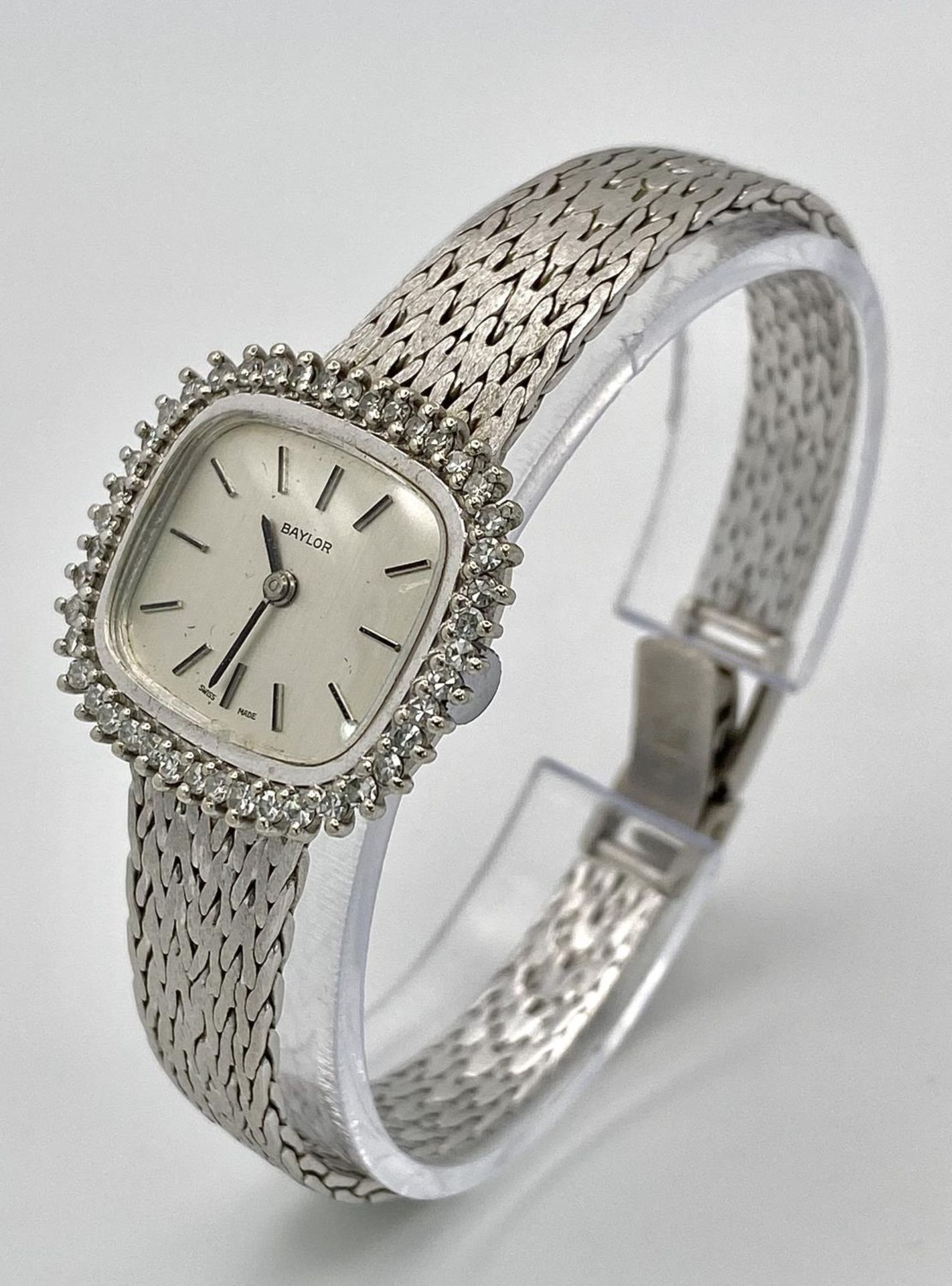 A Vintage Baylor 9K White Gold and Diamond Ladies Watch. 9k gold bracelet and case - 25mm. Diamond