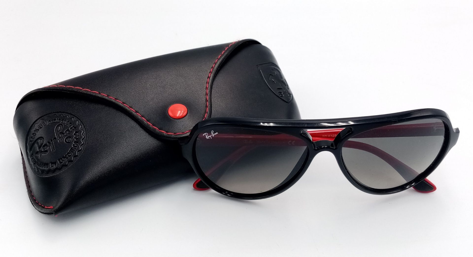 A Pair of Ray Ban Sunglasses with Case.