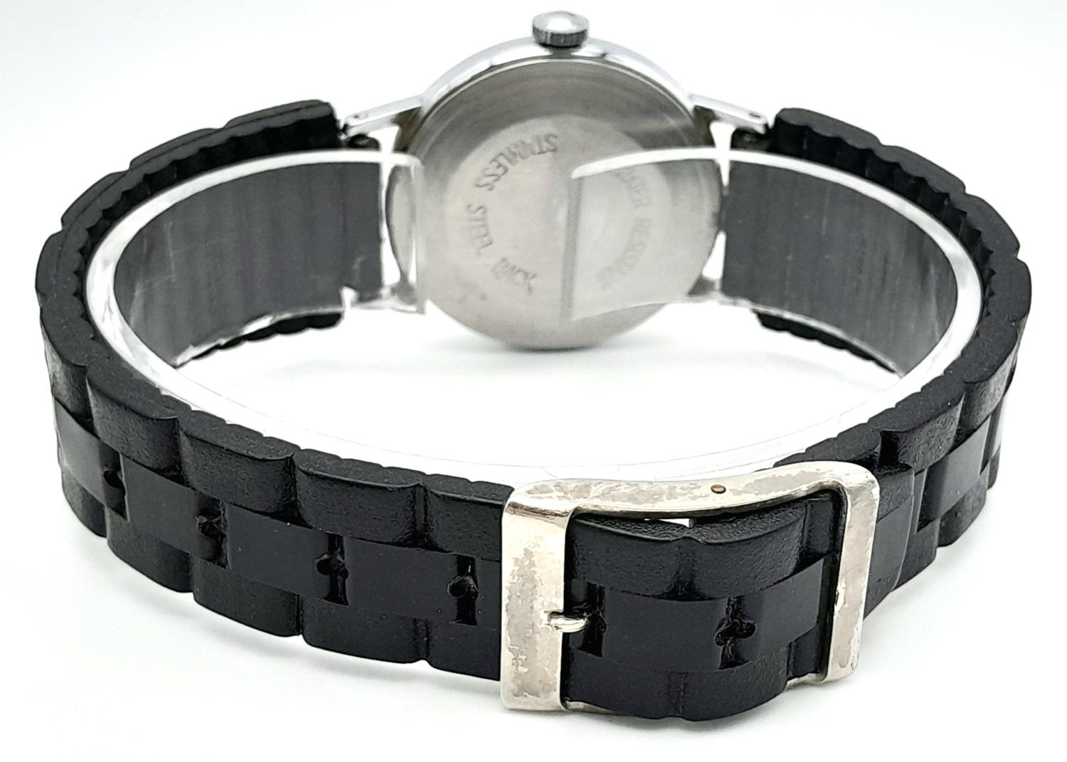A Vintage Timex Mechanical Watch. Black rubber strap. Stainless steel case - 30mm. White dial with - Image 3 of 4