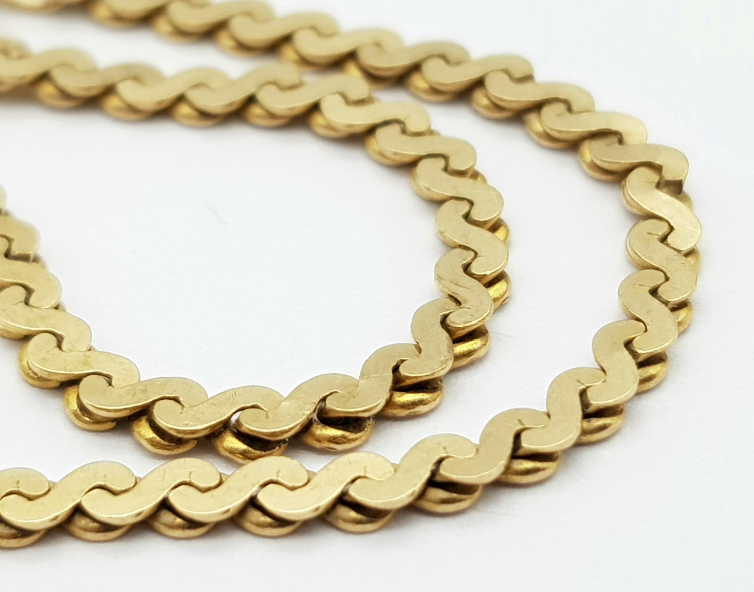 A 9K Yellow Gold Serpentine Link Bracelet. 17cm. 3.9g weight. - Image 4 of 5