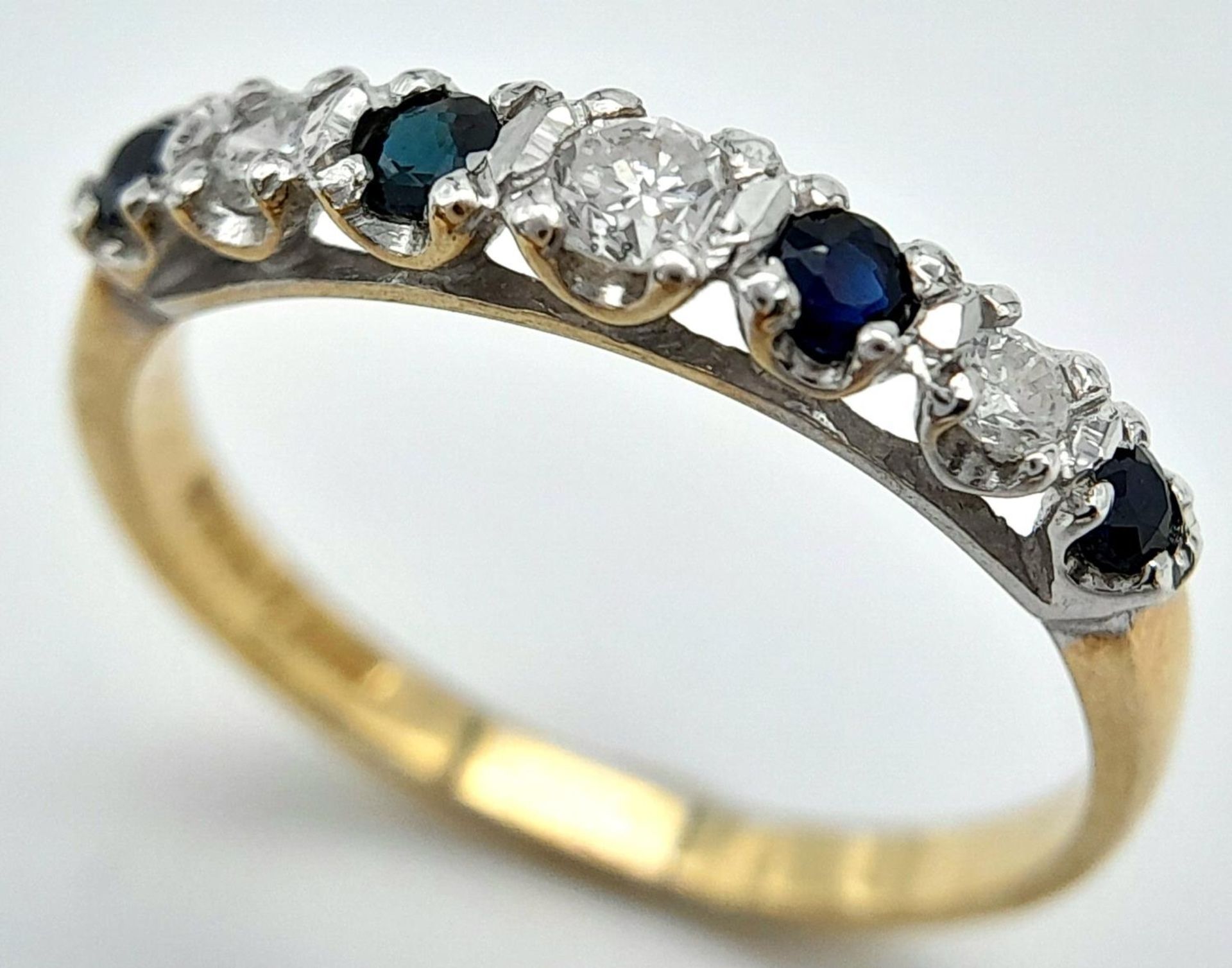 A 9K YELLOW GOLD DIAMOND & SAPPHIRE 7 STONE RING 0.15CT DIAMONDS 1.5G SIZE M 1/2. ref: SPAS 9025 - Image 3 of 5