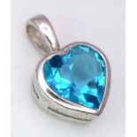 A Blue Topaz Heart Pendant on 925 Silver. 1.7cm length, 1.62g total weight.