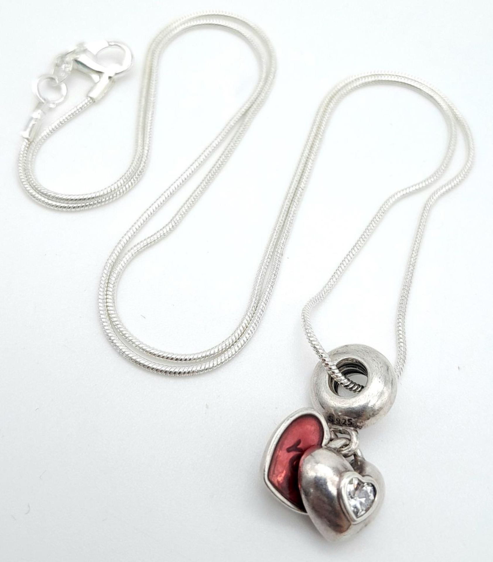 A 925 Silver Pandora Pendant on Snake Chain Necklace. 2.2cm pendant, 56cm necklace, 10.91g total