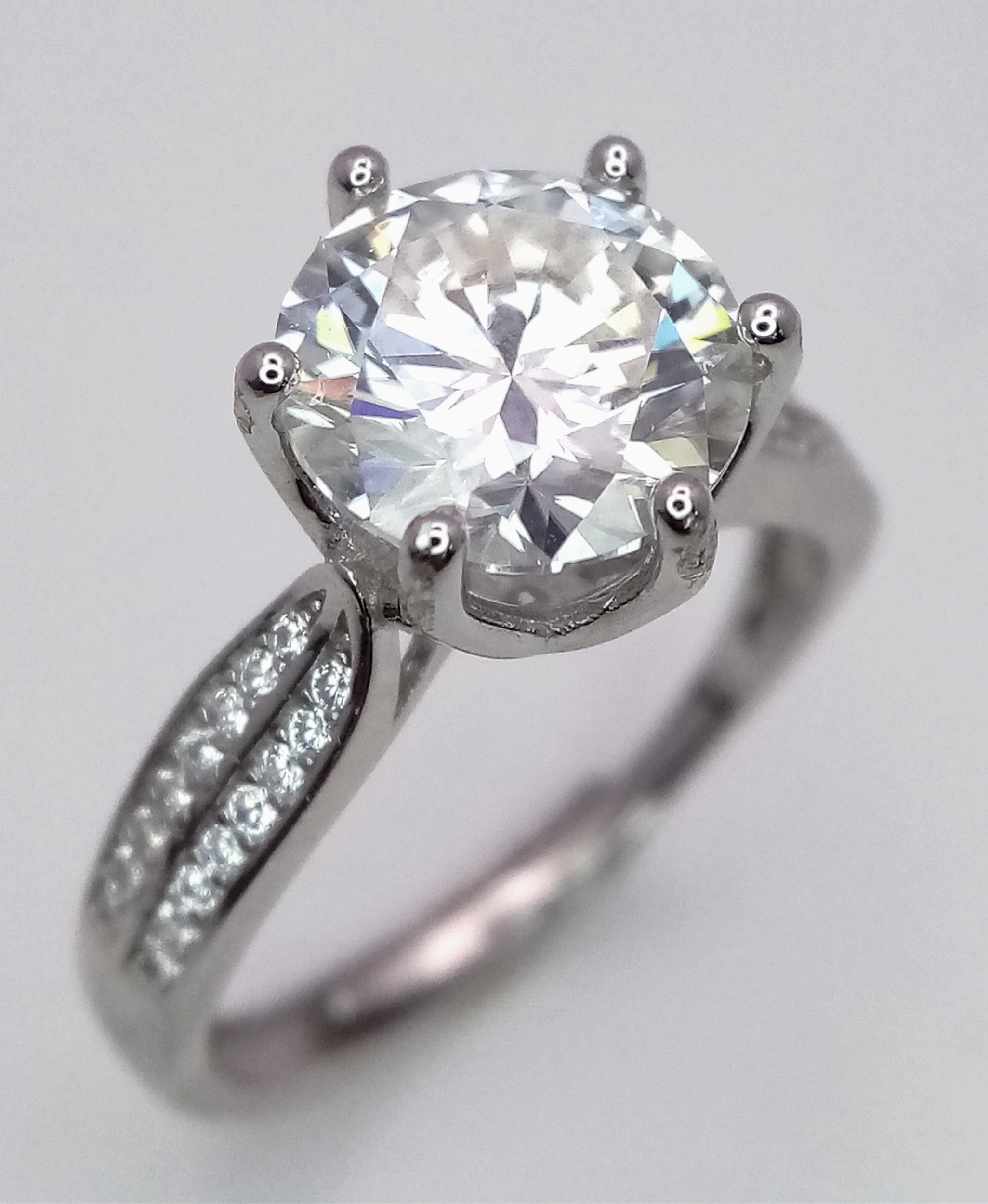 A 3ct Moissanite Ring set in 925 Silver. Size P. Comes with a GRA certificate.