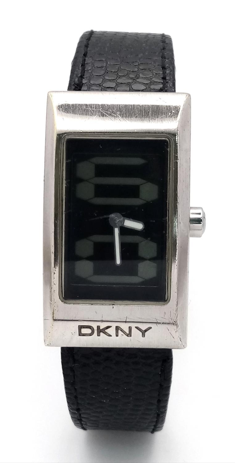 A DKNY Quartz Ladies Watch. Black leather strap. Stainless steel case - 24mm. Analogue/digital dial. - Image 4 of 6