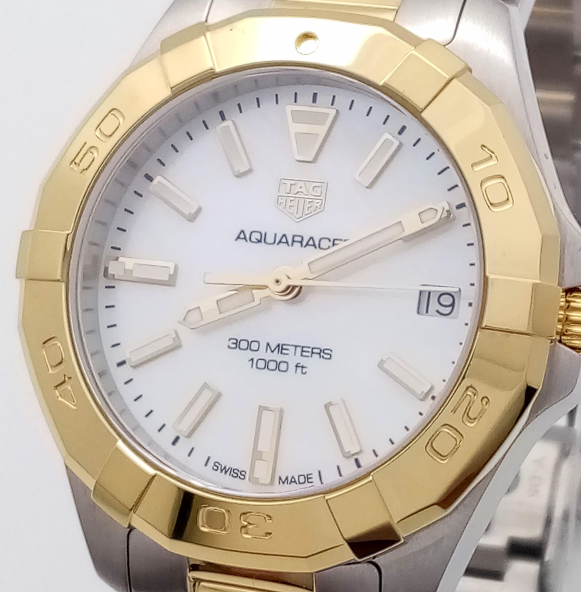 A Tag Heuer Aquaracer Ladies Quartz Watch. Two tone gold plated steel bracelet and case - 32mm. - Image 4 of 13