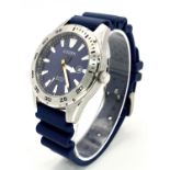 A Citizen Quartz Gents Watch. Blue rubber strap. Stainless steel case - 42mm. Blue dial with date