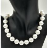 A Bright White South Sea Pearl Shell Bead Necklace. 14mm beads. 40cm. Gilded clasp.