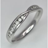 A 18K WHITE GOLD DIAMOND RING 2.9G SIZE N 1/2 0.20CT BL 9005