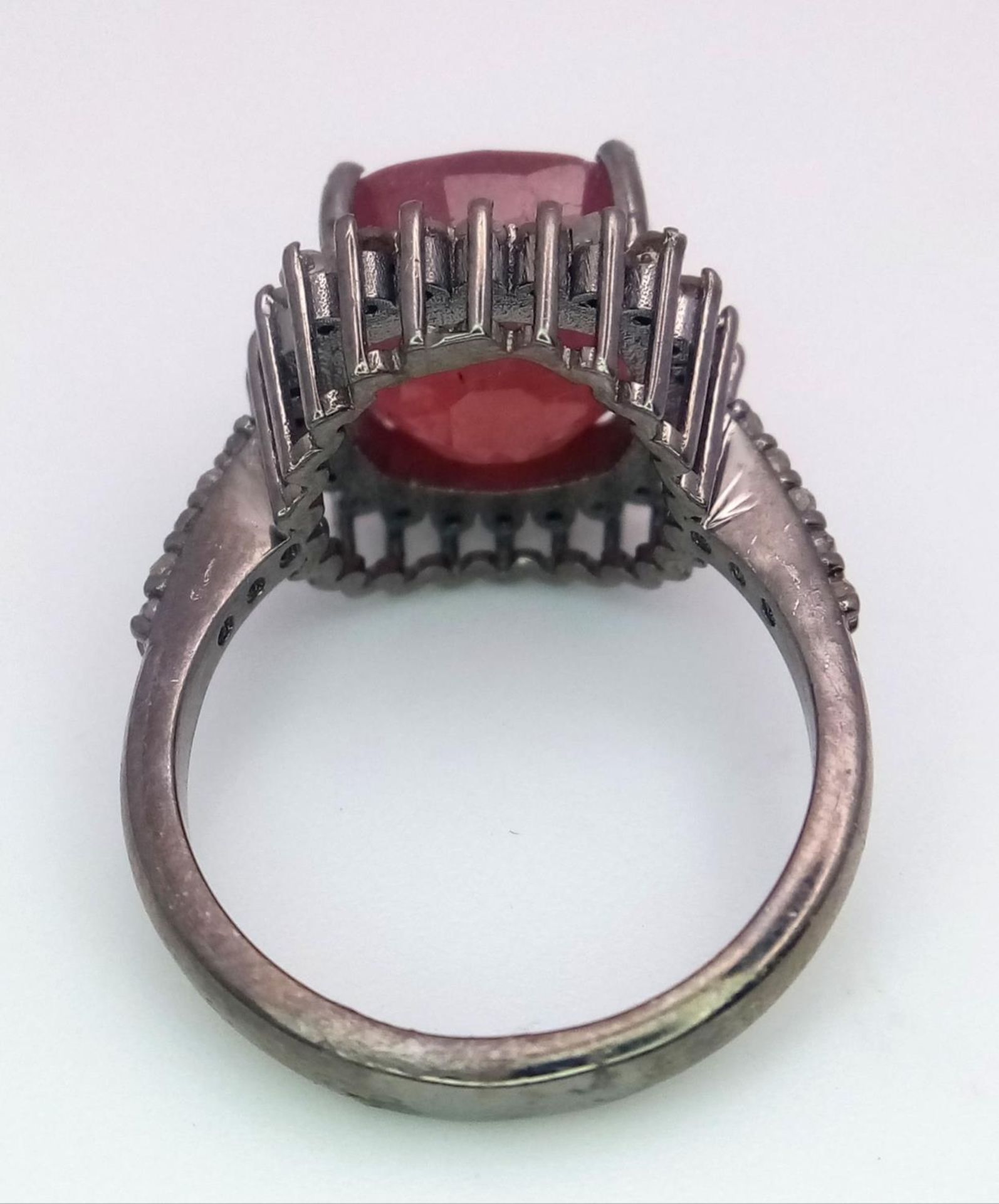 A 4.75ct Ruby Gemstone Ring with 0.80ctw of Diamond Accents. Set in 925 Silver. Size M. Ref: CD-1337 - Image 4 of 5