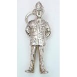 A STERLING SILVER POLICEMAN CHARM 3.3G , 32mm x 10mm. SC 9090