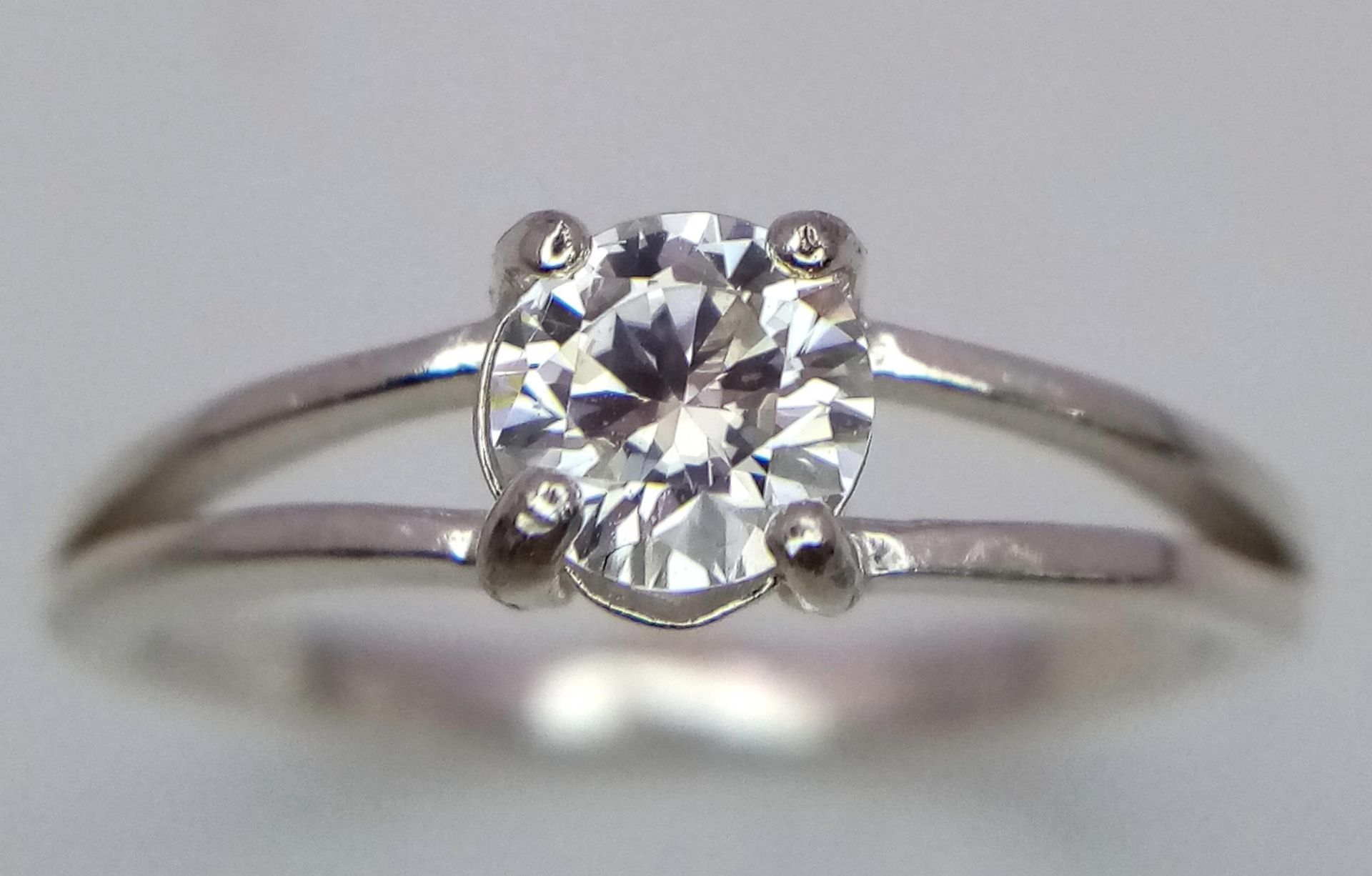 A 0.5ct Moissanite Solitaire Ring. Set in 925 silver. Comes with a GRA certificate. Size M. - Image 2 of 6