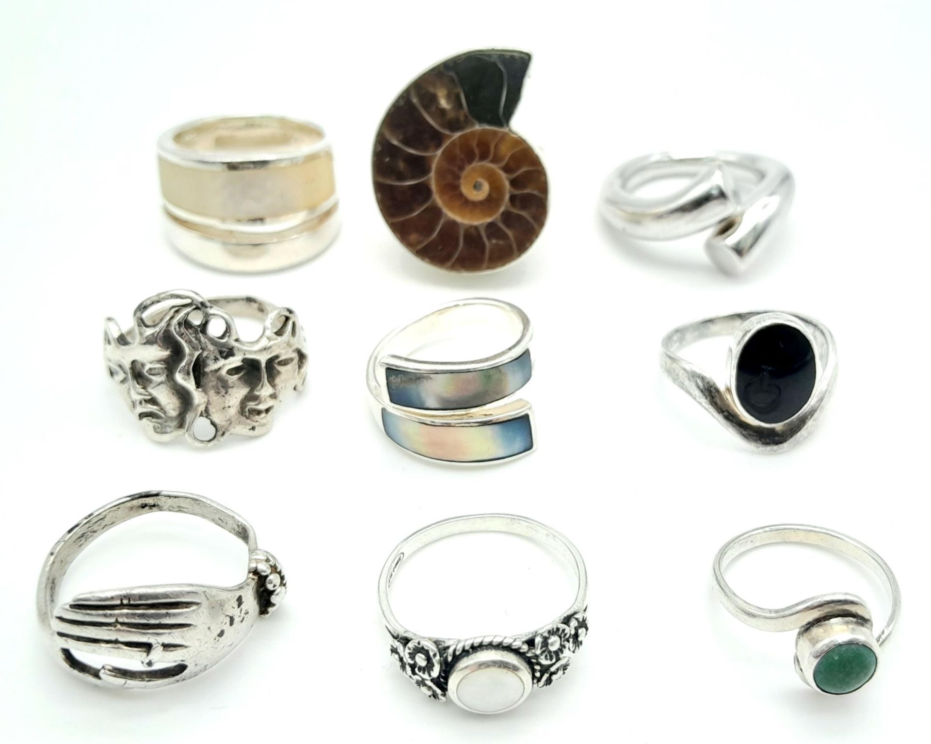 A Collection of Nine Different Style 925 Silver Rings. 40g total weight.