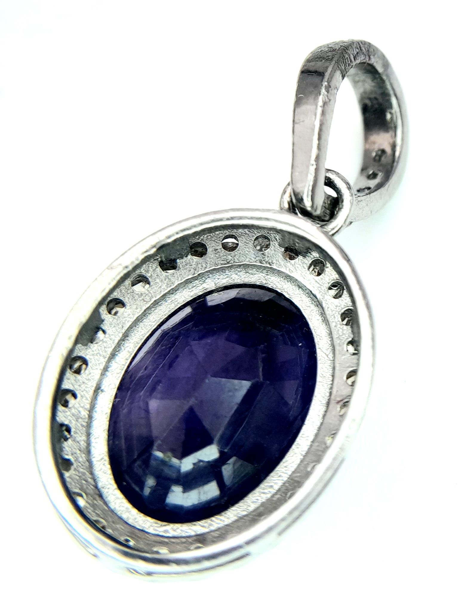 A Blue Sapphire and Rose cut Diamond Pendant. Set in 925 Sterling Silver. Sapphire - 4.30ct. - Image 2 of 3