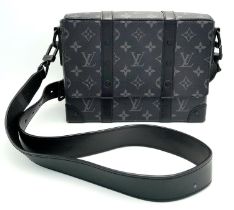 A Louis Vuitton Black Eclipse Trunk Messenger Bag. Monogramed canvas exterior with black-toned