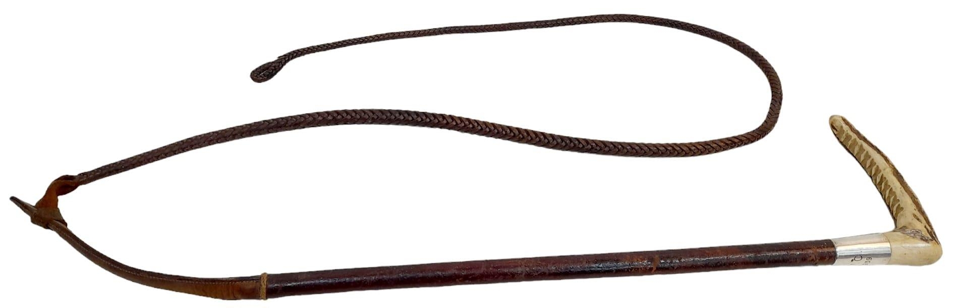 A Vintage Bone Handled Riding Whip. Hard bone gives way to entwined leather - All topped off with - Image 2 of 5