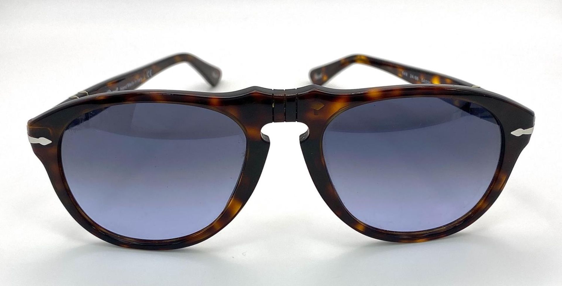 A Pair of Designer Persol Sunglasses.