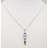 An Unworn Sterling Silver, Topaz Set, ‘Goddess’ Pendant Necklace. 44cm Length Chain, Pendant