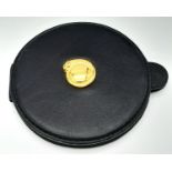 A vintage, CARTIER PANTHER double vanity mirror in a soft black leather cover, diameter: 9 cm.