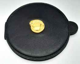A vintage, CARTIER PANTHER double vanity mirror in a soft black leather cover, diameter: 9 cm.