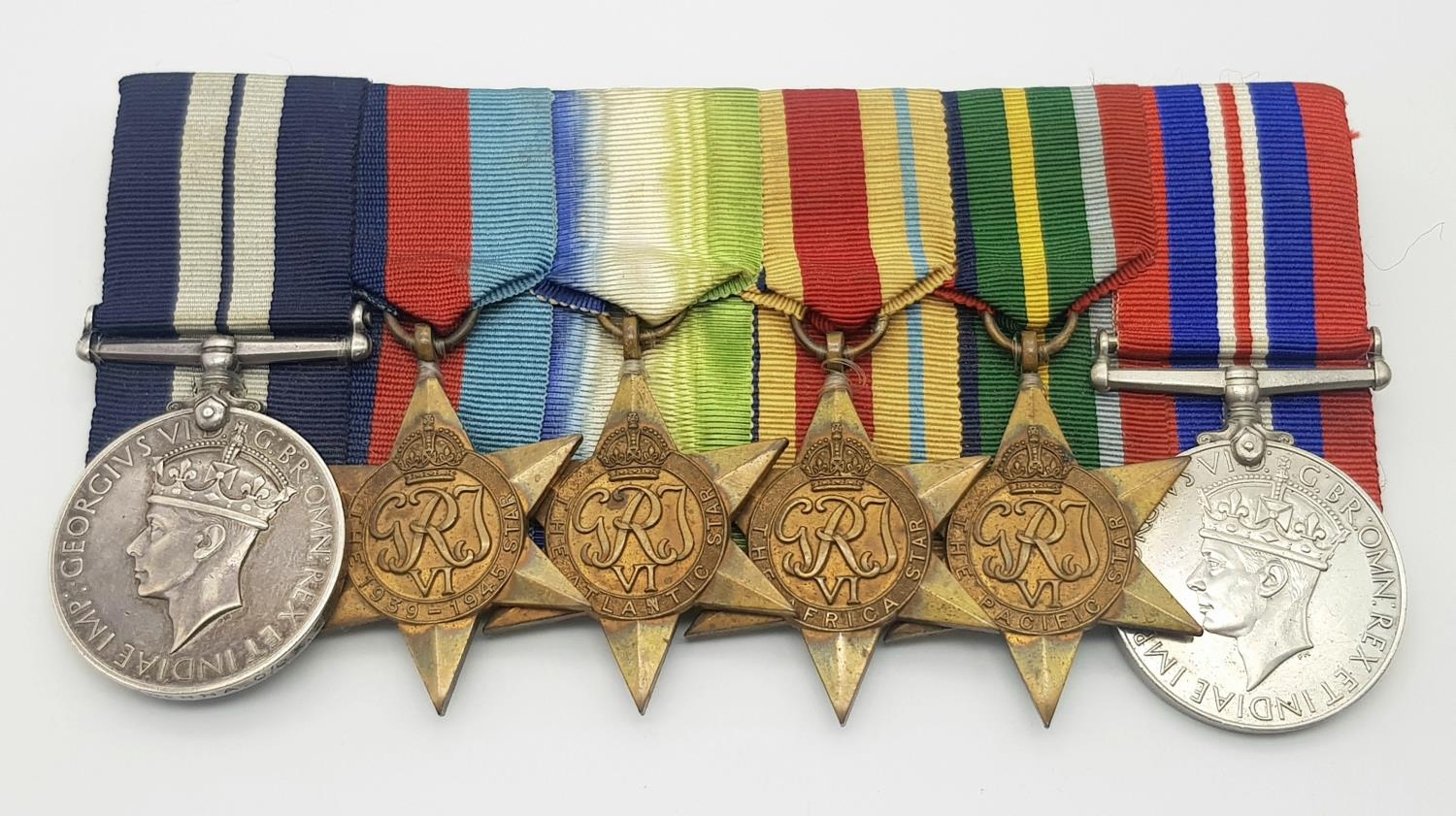 A WW2 Distinguished Service Medal group of six to a Royal Navy Petty Officer for DEMS operations