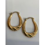Pair of 9 carat GOLD CREOLE HOOP EARRINGS. Having attractive chased design to both sides. 1.0