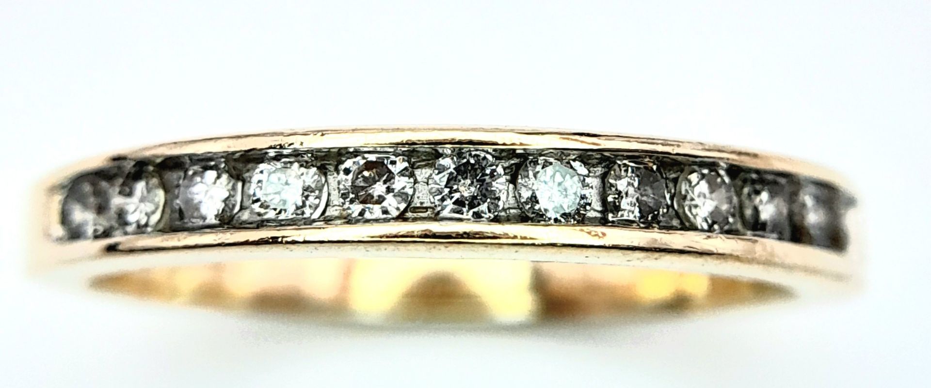 A 14K YELLOW GOLD DIAMOND HALF ETERNITY RING. 0.25ctw, Size N, 2.4g total weight. Ref: SC 8049 - Image 3 of 6