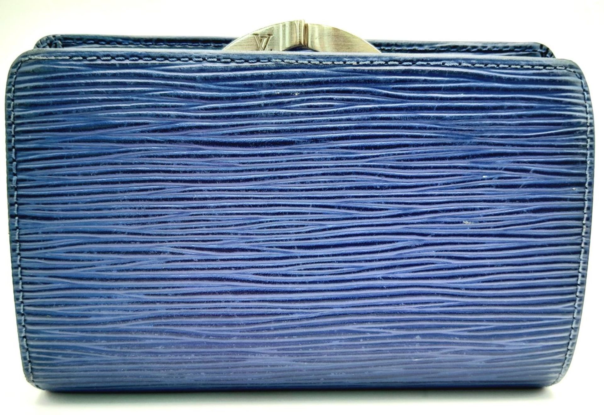 A Vintage Louis Vuitton Blue Bifold Wallet. Epi leather exterior with silver-toned hardware and