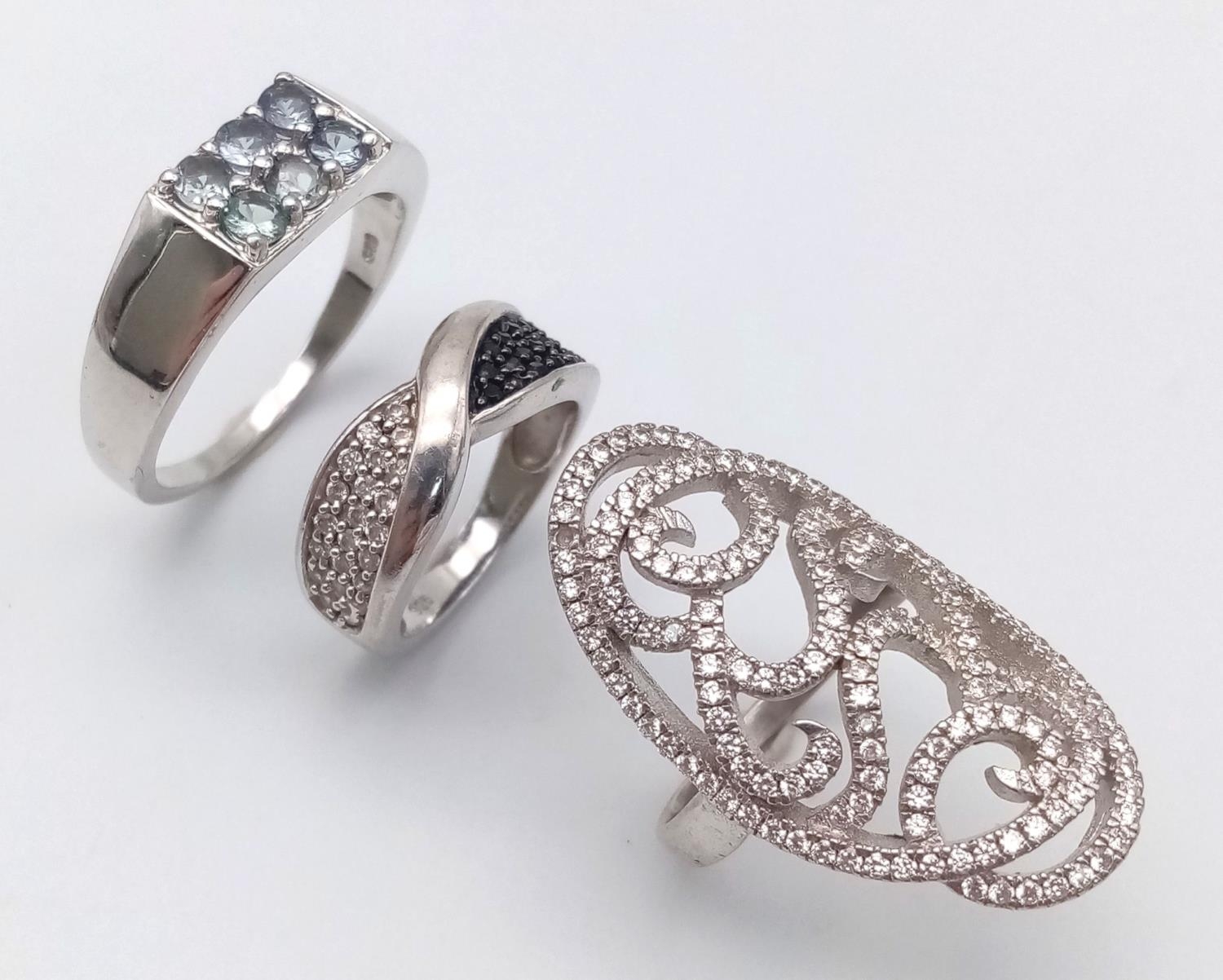 Three 925 Silver Different Style Stone Set Rings. Sizes: J, M and V.